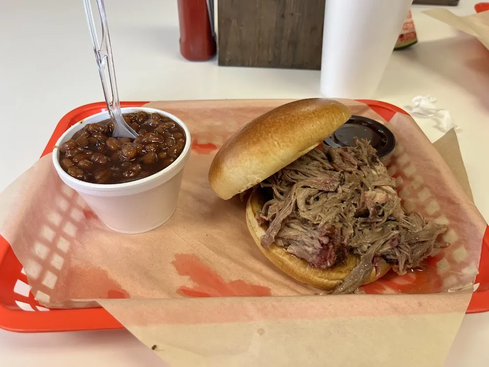 Pulled Pork Sandwhich and BBQ Beans and Cheesecake